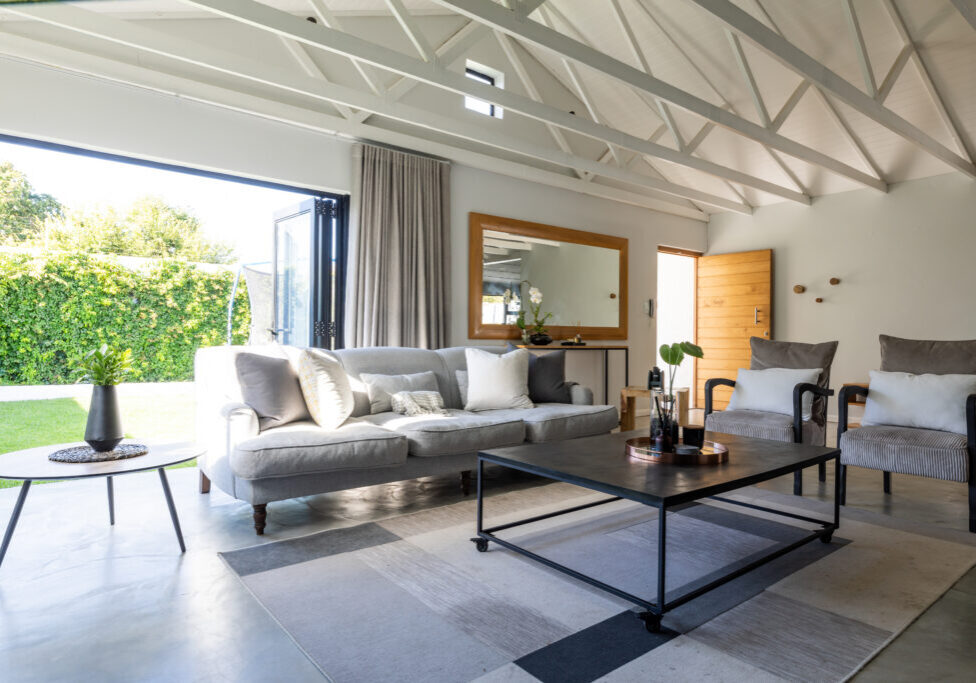 Interior of living room with sofa and center table at home. unaltered, furniture, home and interior decoration concept.